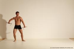 Underwear Fighting with axe Man White Muscular Short Brown Dynamic poses Academic